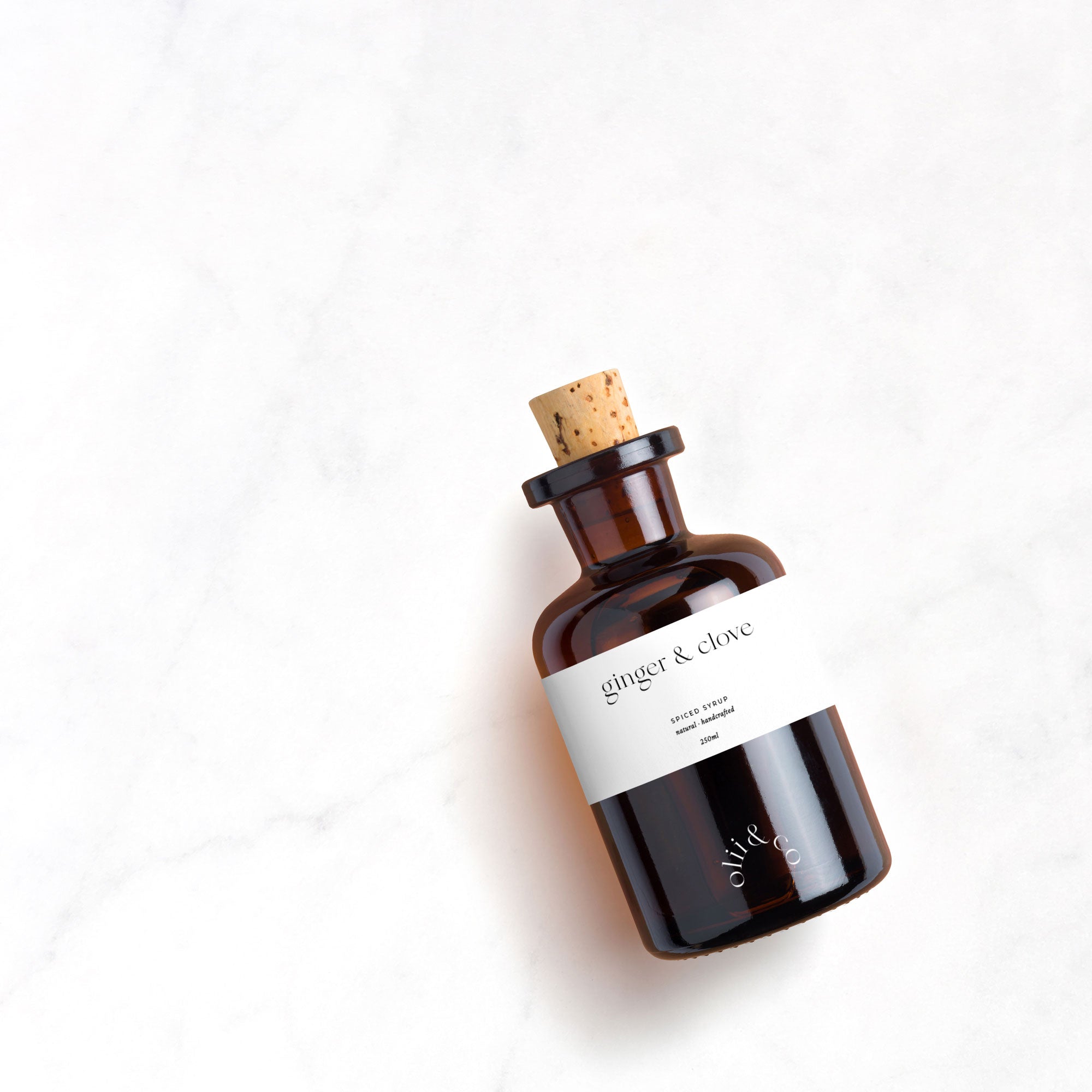 Karolina Król Studio minimalist branding and sustainable packaging design for ginger syrup bottle