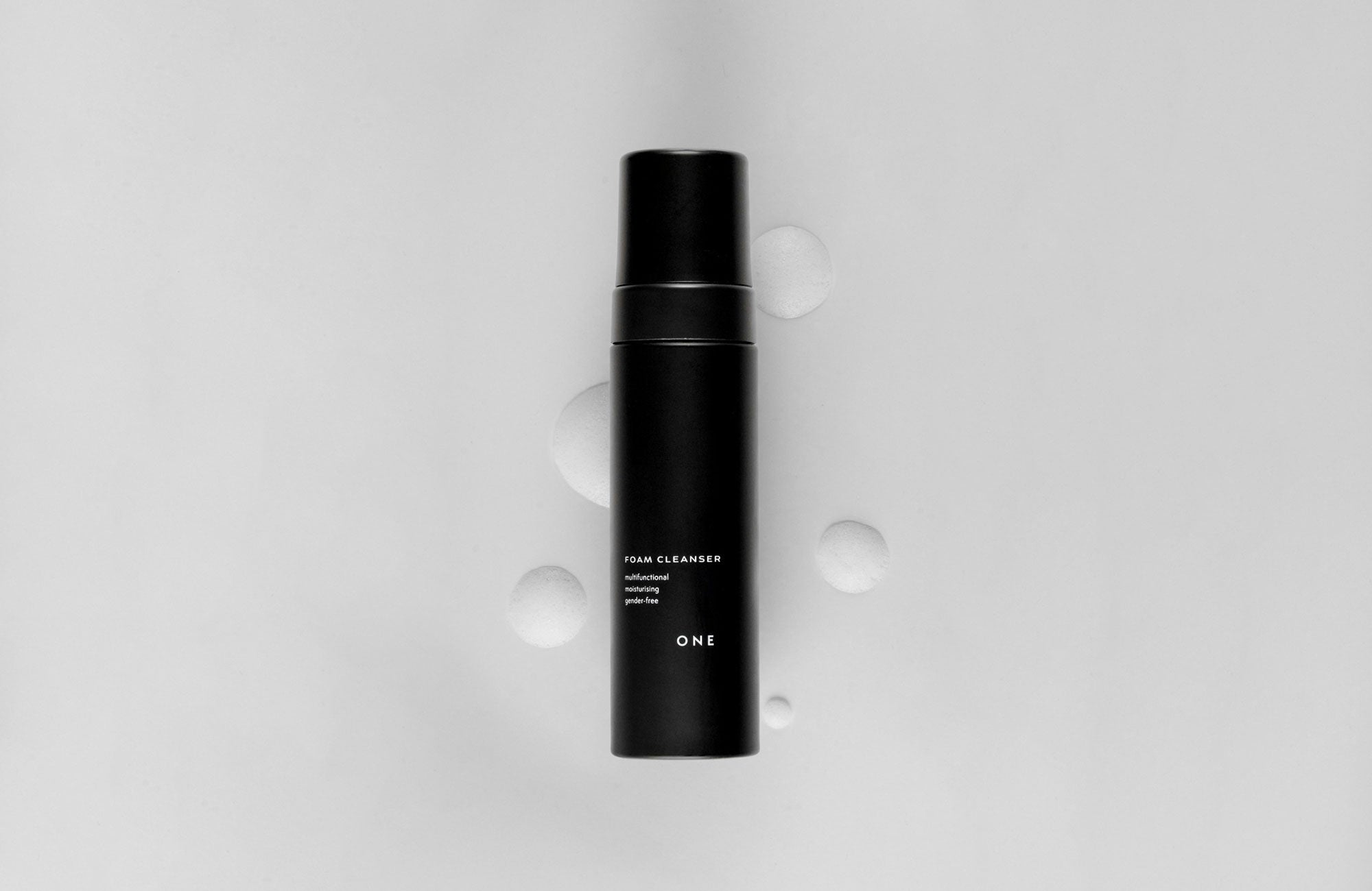 karolina krol studio one skin care foam cleanser bottle minimalist black white packaging design
