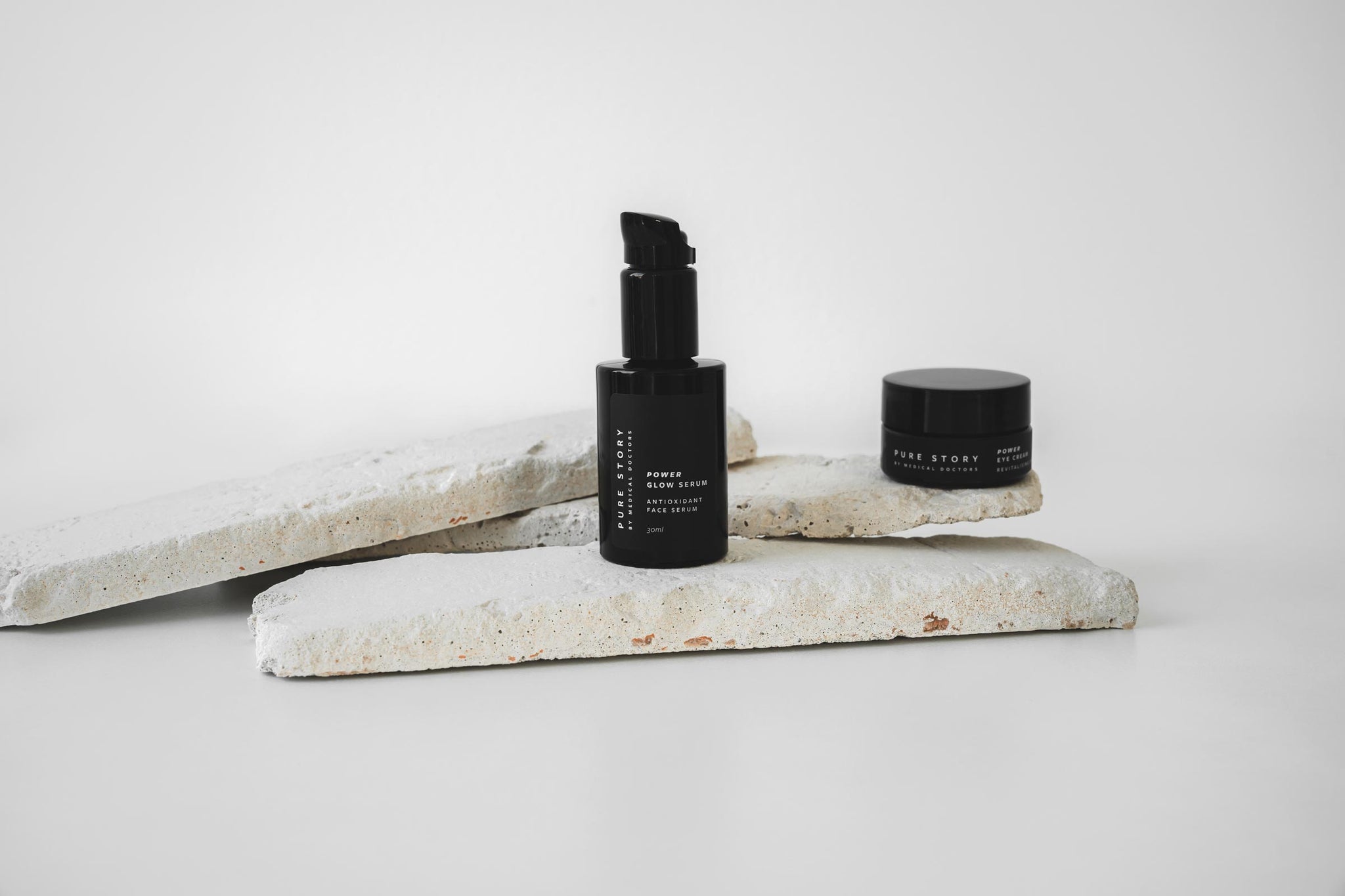 karolina krol studio pure story dermatological cosmetics minimalist brand identity elegant glass bottles packaging
